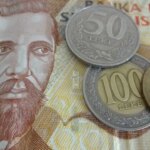 hoe duur is albanië munteenheid